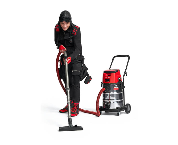 The e team with a wet dry vacuum cleaner